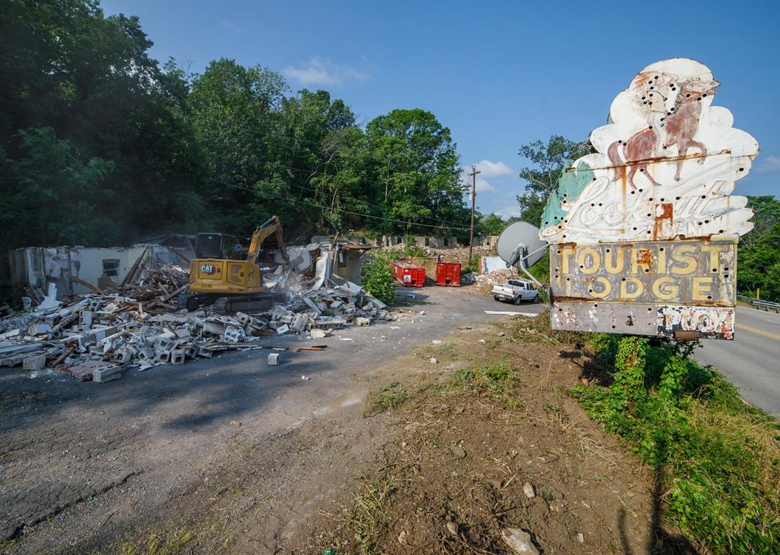 Heavy equipment demolishing a motel on Lookout Mountain